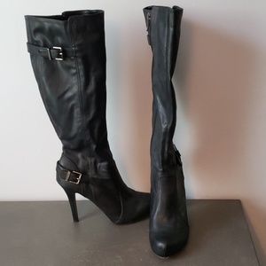 Knee high black strapped thin heel boots